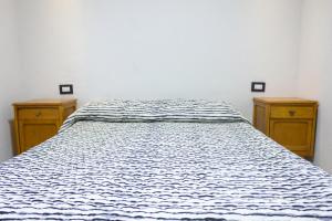 מיטה או מיטות בחדר ב-El Fulgor - Posada - Chacras de Coria