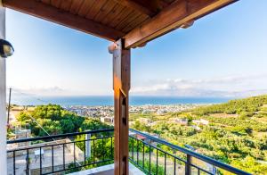 a balcony with a view of the ocean at Lilian View Studio in Kissamos