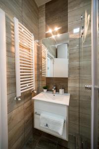 Kylpyhuone majoituspaikassa CENTAR Lux