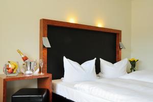 Letto o letti in una camera di Hotel Prinzen