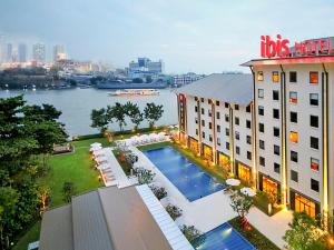 an overhead view of a hotel with a swimming pool at Ibis Bangkok Riverside in Bangkok