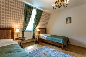 Posteľ alebo postele v izbe v ubytovaní Karlsbad Prestige
