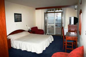 Postel nebo postele na pokoji v ubytování Hotel Miramare + 37 fotografií