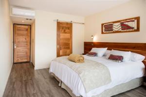 Postel nebo postele na pokoji v ubytování Maki Hotel