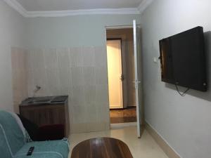 TV a/nebo společenská místnost v ubytování Guesthouse in Batumi + 24 fotografií