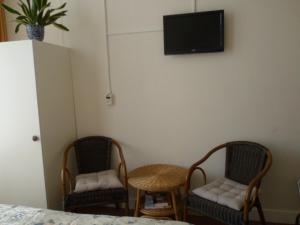 Sjónvarps- og/eða afþreyingartæki á Staten Hotel
