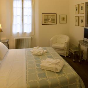 Кровать или кровати в номере M Club De Luxe B&B