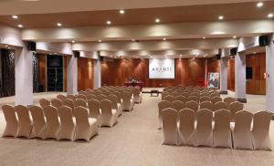 a large room with chairs and a stage in it at Avanti Mohammedia Hotel in Mohammedia