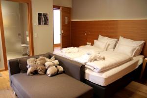 Una cama o camas en una habitación de Mats Lech Alpenquartier
