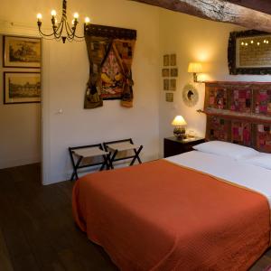 Кровать или кровати в номере M Club De Luxe B&B