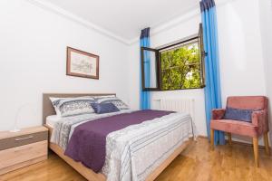 Posteľ alebo postele v izbe v ubytovaní Holiday home Ruzmarin