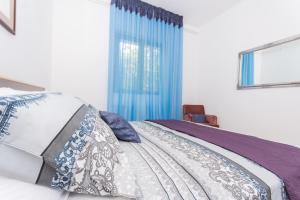 Posteľ alebo postele v izbe v ubytovaní Holiday home Ruzmarin