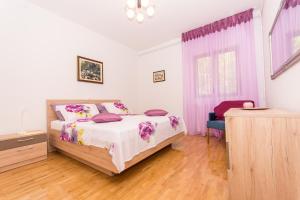 Posteľ alebo postele v izbe v ubytovaní Holiday home Ruzmarin