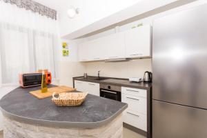 Kuchyňa alebo kuchynka v ubytovaní Holiday home Ruzmarin