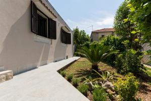 Vonkajšia záhrada v ubytovaní Holiday home Ruzmarin