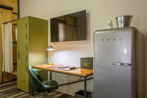 Kuchyň nebo kuchyňský kout v ubytování Cavalry Court, by Valencia Hotel Collection