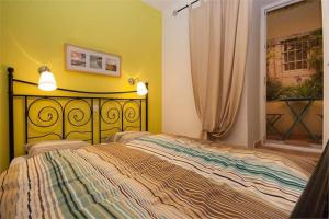 Postel nebo postele na pokoji v ubytování Apartments Mediteranea