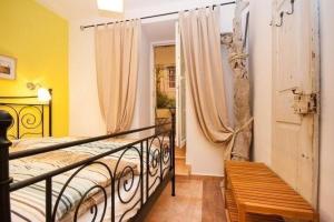 Postel nebo postele na pokoji v ubytování Apartments Mediteranea