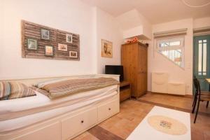 Posteľ alebo postele v izbe v ubytovaní Apartments Mediteranea