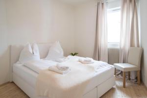 Posteľ alebo postele v izbe v ubytovaní Chalet Happy Family, secluded location, 15 min to salzburg and just short to t lakes sound of music, BBQ&bikes&sunbeds for free, up to 14p