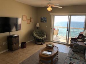 Μια τηλεόραση ή/και κέντρο ψυχαγωγίας στο VacayFun Condos - Caribbean