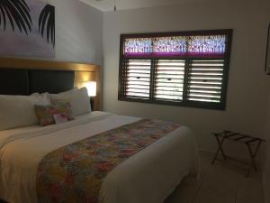 Voodi või voodid majutusasutuse Buccaneer Beach Club toas