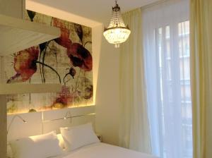 Posteľ alebo postele v izbe v ubytovaní Maison Fleurie