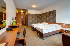 Posteľ alebo postele v izbe v ubytovaní Hotel Iberia