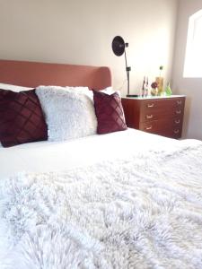 Ένα ή περισσότερα κρεβάτια σε δωμάτιο στο Squadron Base