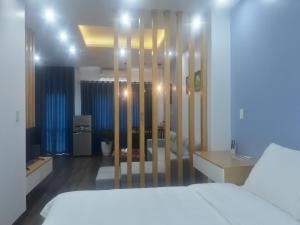 Giường trong phòng chung tại Hà Thịnh Phát Apartment