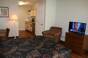 Krevet ili kreveti u jedinici u objektu Affordable Suites Greenville