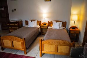 Posteľ alebo postele v izbe v ubytovaní Hotel Krak