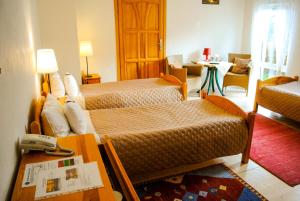 Кровать или кровати в номере Hotel Krak