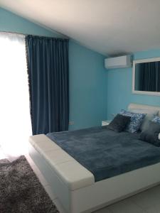 Кровать или кровати в номере Villa Diana
