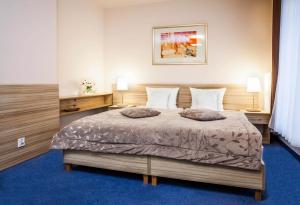 Postel nebo postele na pokoji v ubytování Hotel Arsenał + 34 fotografií
