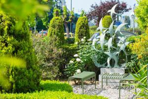 A garden outside Athinais Hotel