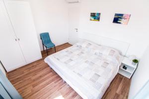 Posteľ alebo postele v izbe v ubytovaní Apartman Nella