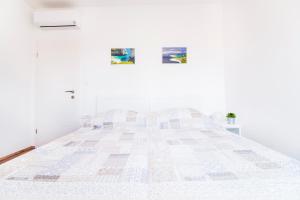 Posteľ alebo postele v izbe v ubytovaní Apartman Nella