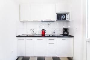 Kuchyňa alebo kuchynka v ubytovaní Apartman Nella