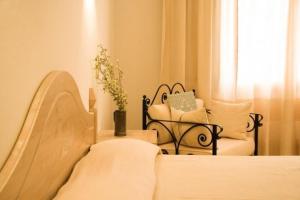 Postel nebo postele na pokoji v ubytování Hotel Libyssonis