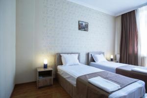 Katil atau katil-katil dalam bilik di Hotel Old Borjomi