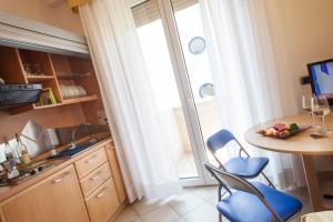 Telewizja i/lub zestaw kina domowego w obiekcie San Giorgio Savoia