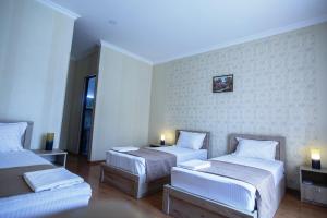 Katil atau katil-katil dalam bilik di Hotel Old Borjomi