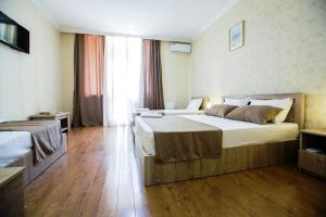 Katil atau katil-katil dalam bilik di Hotel Old Borjomi