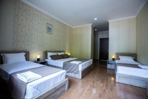 Katil atau katil-katil dalam bilik di Hotel Old Borjomi