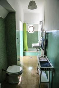 Um banheiro em Villa Malacari