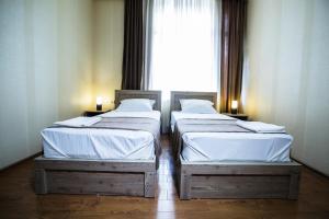 Katil atau katil-katil dalam bilik di Hotel Old Borjomi