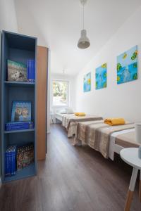 Postel nebo postele na pokoji v ubytování Villa Stina