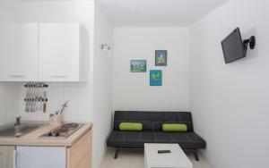 Kuchyň nebo kuchyňský kout v ubytování Villa Stina