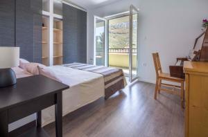 Postel nebo postele na pokoji v ubytování Villa Stina